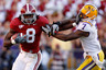 BATON ROUGE LA - NOVEMBER 06:  Julio Jones #8 of the Alabama Crimson Tide avoids a tackle by Patrick Peterson #7 of the Louisiana State University Tigers at Tiger Stadium on November 6 2010 in Baton Rouge Louisiana.  The Tigers defeated the Crimson Tide 24-21.  (Photo by Chris Graythen/Getty Images)