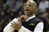 LSU basketball coach Trent Johnson gestures to his players in the first half of the NCAA college basketball game against Mississippi State in Starkville, Miss., Wednesday, Jan. 25, 2012. Number 18 Mississippi State won 76-71. (AP Photo/Rogelio V. Solis)