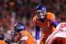 BOISE ID - NOVEMBER 19: Kellen Moore #11 of the Boise State Broncos calls the play against the Fresno State Bulldogs at Bronco Stadium on November 19 2010 in Boise Idaho. (Photo by Otto Kitsinger III/Getty Images)