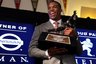 Auburn quarterback Cam Newton reacts during a news conference after winning the Heisman Trophy award, Saturday, Dec. 11, 2010, in New York. (AP Photo/Craig Ruttle)